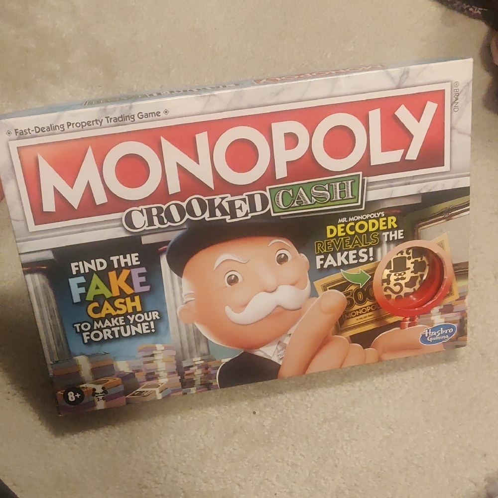 New!HasbRo Monopoly Crooked Cash Board Game